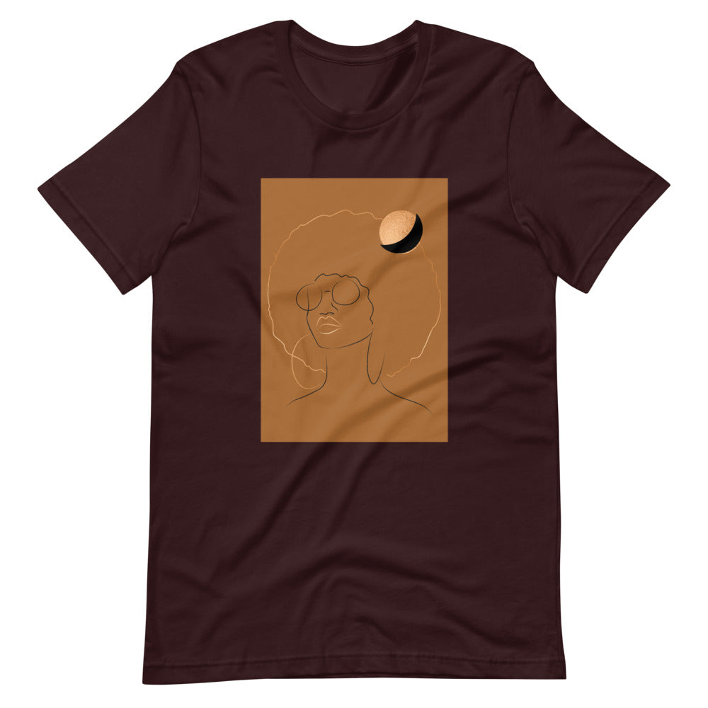 Oxblood Black Colored t-shirt with a gold printed image of a beautiful black women with an afro and a gold moon over her head
