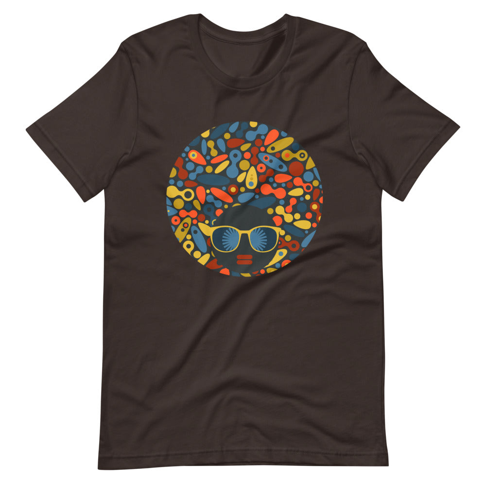 Brown  color t shirt with colorful design of a black women with geometric shapes and cool glasses "Be Bold"