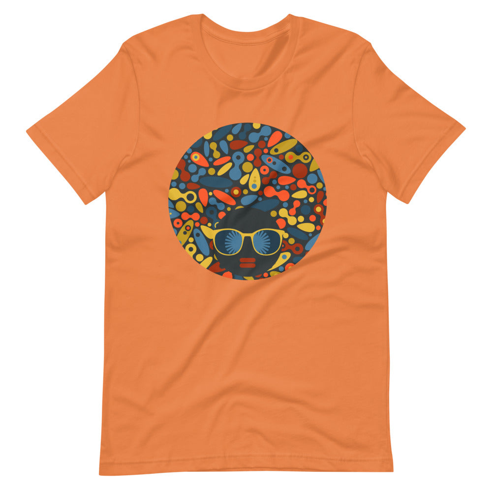 Burnt Orange color t shirt with colorful design of a black women with geometric shapes and cool glasses "Be Bold"