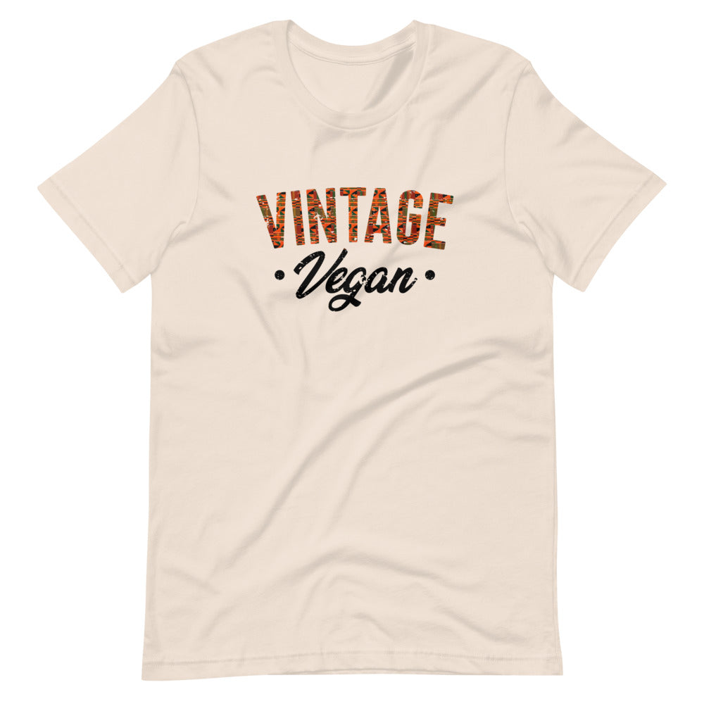 Soft Cream colored t shirt , this Vintage Vegan t-shirt is all about going old school and eating and living well, this t shirt is soft, lightweight, and good stretch. Comfortable, flattering for all gender.