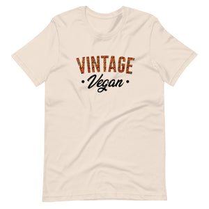 Soft Cream colored t shirt , this Vintage Vegan t-shirt is all about going old school and eating and living well, this t shirt is soft, lightweight, and good stretch. Comfortable, flattering for all gender.